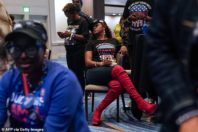 Despondent Democrats at a watch party in Atlanta, Georgia. Pollsters have predicted a second term as POTUS for Donald Trump