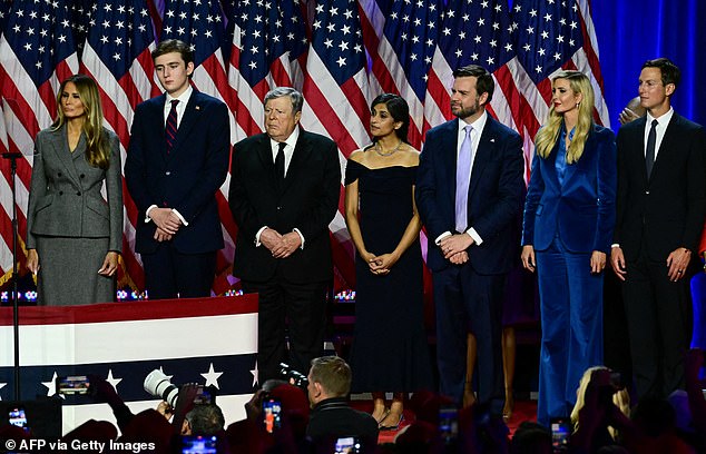 (L-R) Former US First Lady Melania Trump, Barron Trump, Viktor Knavs, Republican vice presidential candidate JD Vance and his wife Usha Vance, Ivanka Trump and her husband Jared Kushner listen to the Republican leader