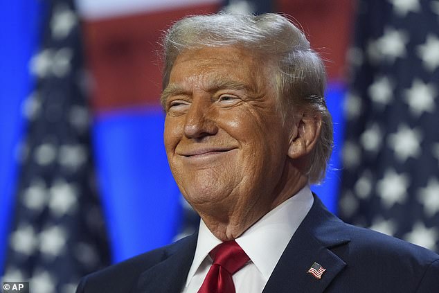 Donald Trump smiles during an election night watch party at the Palm Beach Convention Center