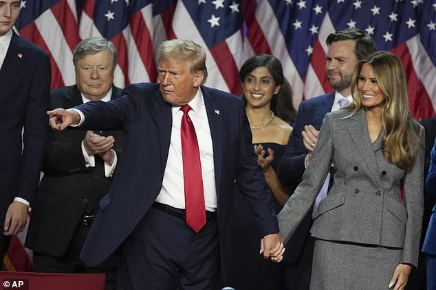 Trump (pictured left with his wife Melania) declared victory early on Wednesday morning (US time) in the presence of a large group of Republican supporters