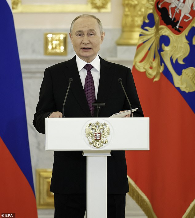 Russian President Vladimir Putin (C) speaks during a ceremonial presentation of credentials by ambassadors in Moscow, Russia, November 5, 2024