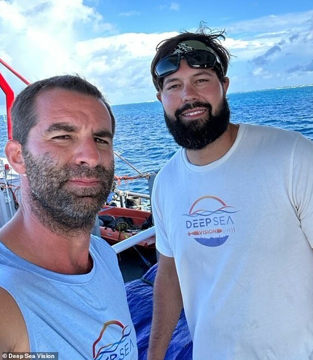 Tony Romeo (left) is seen with DSV operations chief Corey Friend leaving Tarawa, Kiribati on September 8, 2023