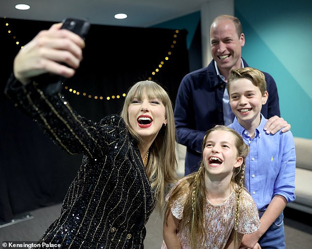 Taylor Swift poses with the Prince of Wales and his children Prince George and Princess Charlotte ahead of one of her concerts at Wembley Stadium in London in June. The singer encourages fans to trade homemade beaded bracelets with names or words on them