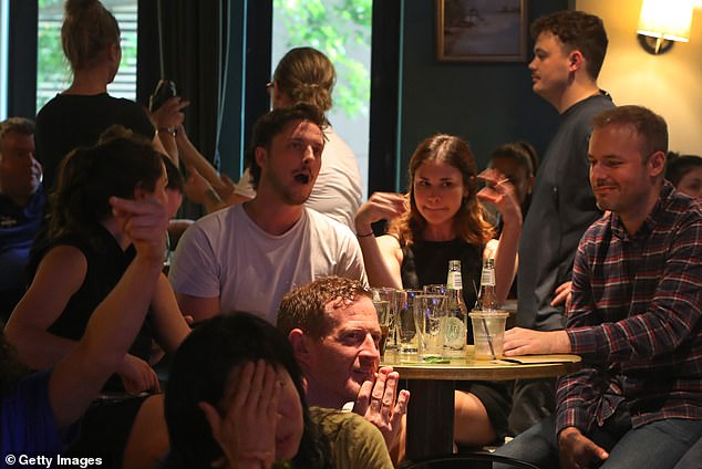 As of 3:45 a.m. Wednesday morning in Washington, the Harris camp had not responded to the results as the Associated Press waited for the final call (photo, audience of an election livestream in Sydney)