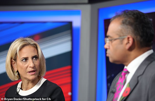 The former Newsnight presenter (left) was laughed at by her co-presenter (right) earlier in the evening after letting a swear word slip