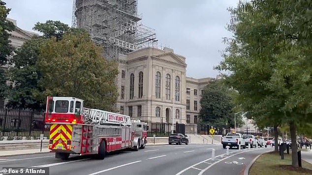 Atlanta Gas Light, which is on scene, said a 6-inch gas line was damaged. Roads in the area are closed to commuters and are expected to reopen around 1 p.m