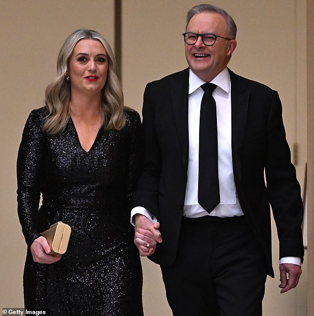 Commenters slammed Mr Albanes (pictured with fiancée Jodie Haydon) for being too 'woke'