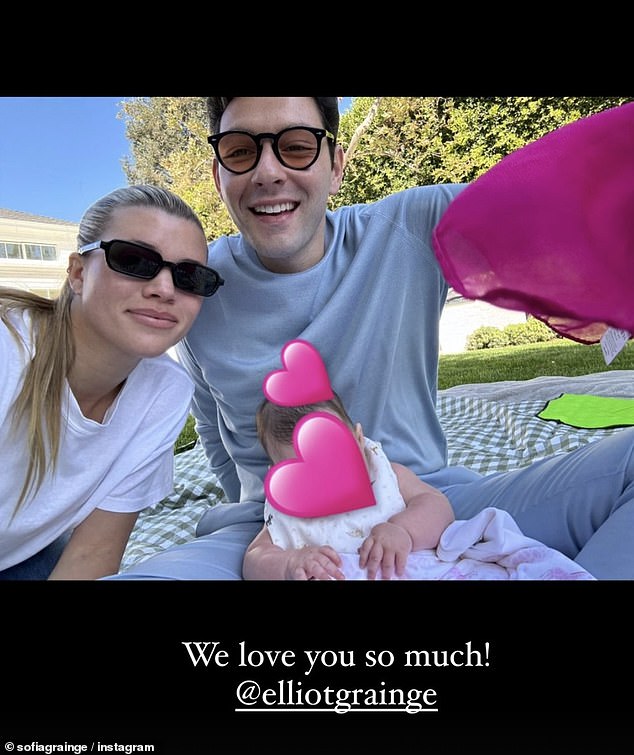 In another post, fans got a glimpse of the little one's short blonde hair as the family of three enjoyed a picnic in the sun