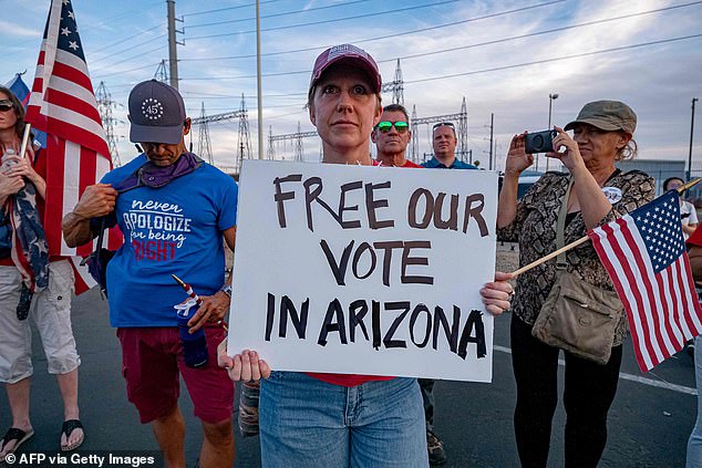 Maricopa is the fourth largest county in America with 4.5 million residents and was previously Republican. (Trump supporters gather to protest outside Maricopa County Elections Department in 2020).