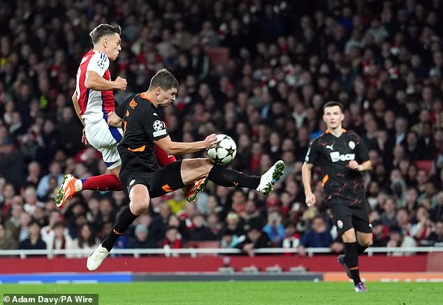 Arsenal were awarded a penalty against Shakhtar Donetsk after a cross hit a defender's hand