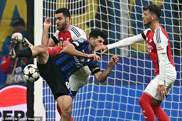 Arsenal's Mikel Merino was penalized for handball on the stroke of half-time at the San Siro