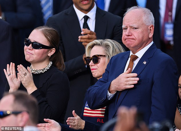 Harris' running mate Tim Walz and his wife Gwen are seen here Wednesday night conceding the election