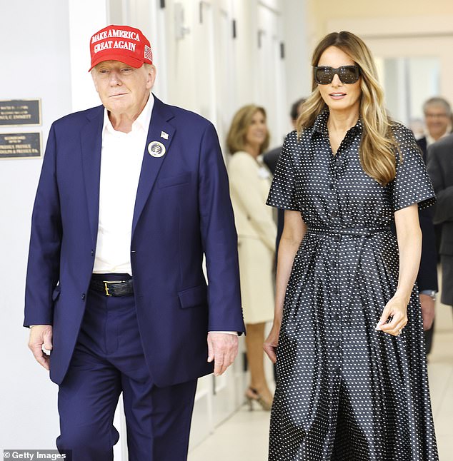 The former first lady has tried to avoid the spotlight for the past four years, but was spotted voting with him in West Palm Beach, Florida, on Tuesday.