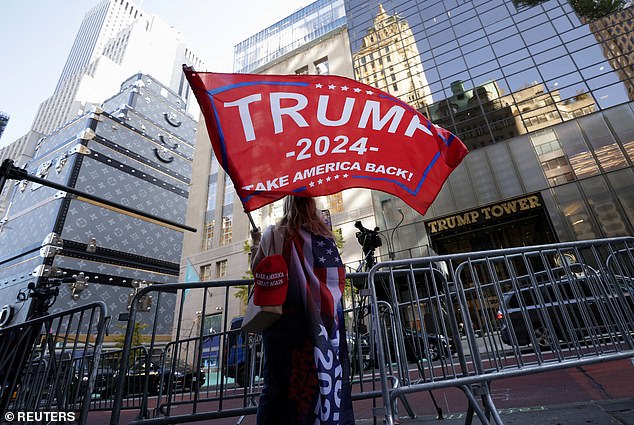 Trump supports waving flags outside the President-elect Tower in New York City