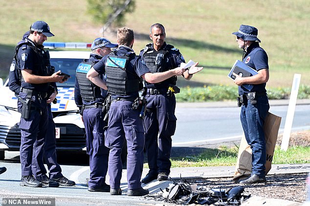 Queensland police are investigating whether the teen may have run a red light before the Audi crashed into the Toyota sedan (police photo at the scene)