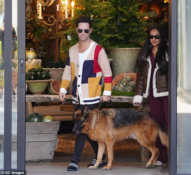 Sasha wore a cozy color-block cardigan, white tank top and black jeans. Jenn wore a warm, teddy-lined biker jacket with a burgundy sweatsuit underneath