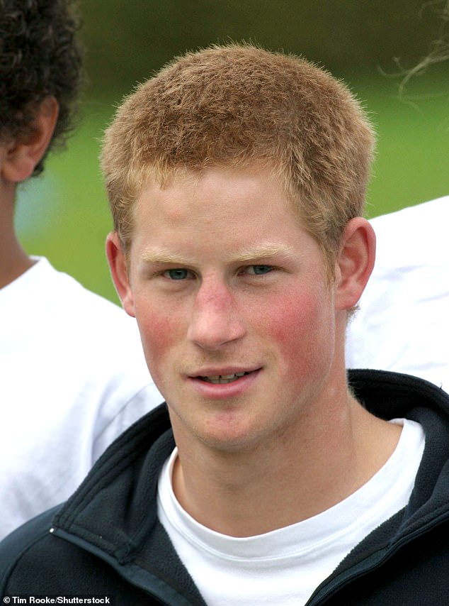 The prince, with short hair, works as an assistant development officer at the Rugby Football Union at a primary school in 2004