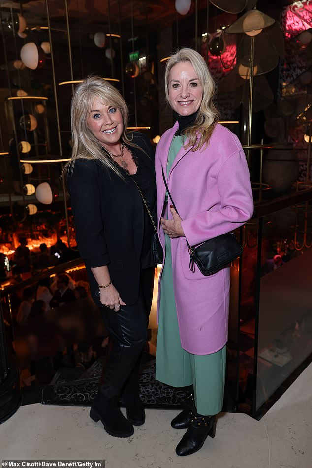 The actress, 54, posed with A Place In The Sun presenter Lucy Alexander, 54, at the bash