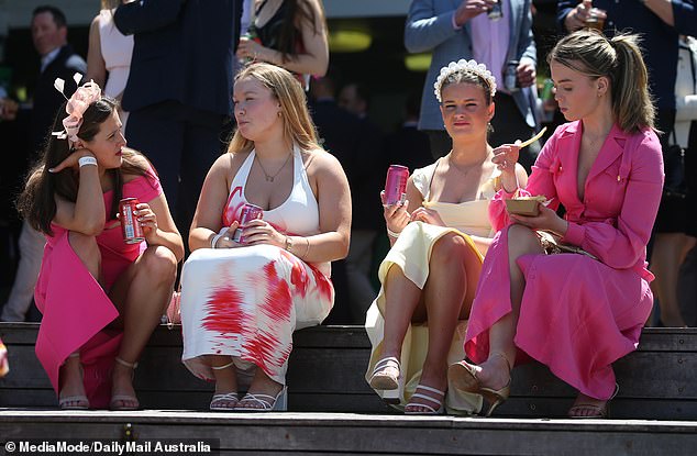 Beautiful in pink: Many visitors to Oaks Day wore pink in honor of the day's long tradition