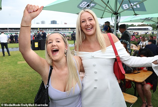 Those present on Crown Oaks Day were smiling despite the bad weather