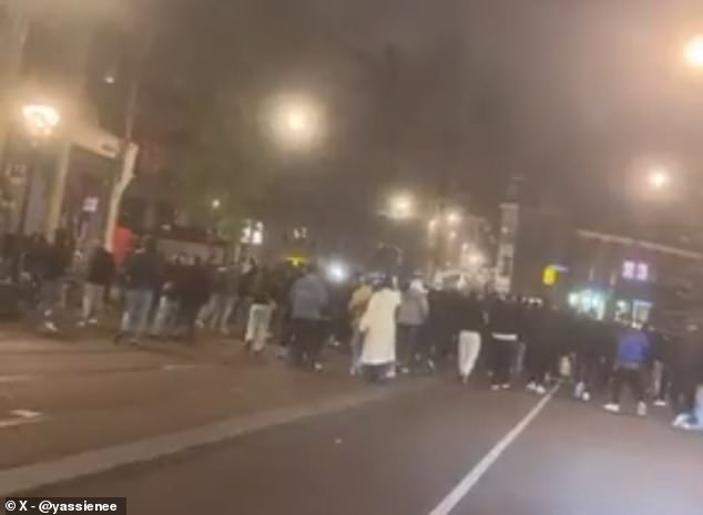 Large groups of supporters marched through the streets of central Amsterdam on Wednesday