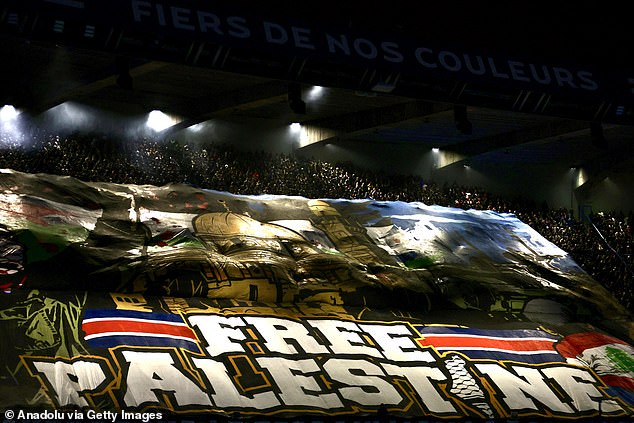 PSG fans unfurled a huge 'Free Palestine' banner before their match against Atletico Madrid