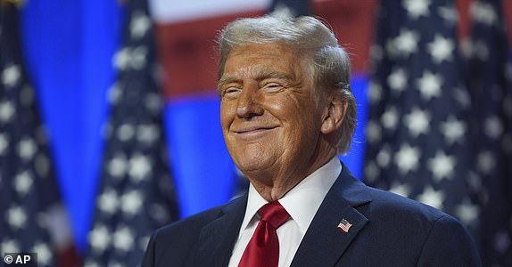 Republican presidential candidate, former President Donald Trump, smiles during an election night watch party at the Palm Beach Convention Center, Wednesday, Nov. 6, 2024, in West Palm Beach, Florida. (AP Photo/Evan Vucci)