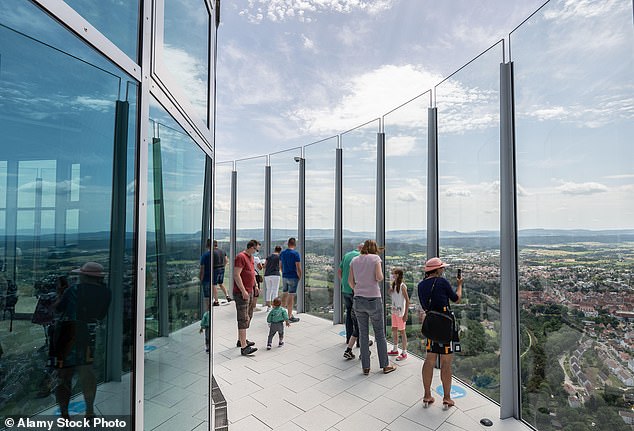 Visitors stand on the visitor platform of the Thyssenkrupp test tower