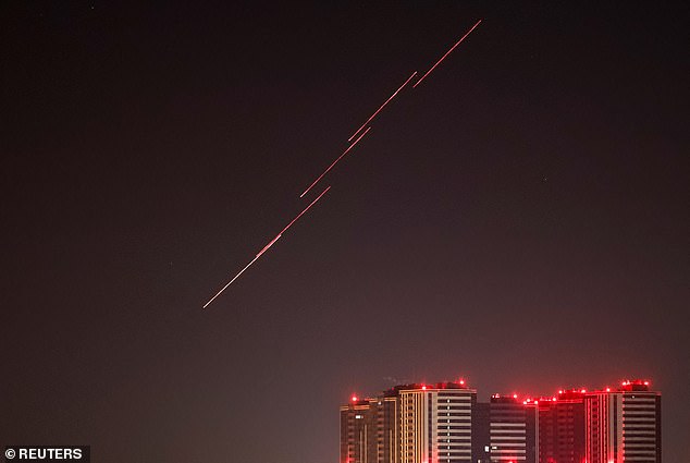 Russia's demands come as it targets Kiev with a massive drone strike. Photo: Tracers are seen in the night sky as Ukrainian soldiers fire at the drone during a Russian drone strike, amid Russia's assault on Ukraine, in Kiev, Ukraine today