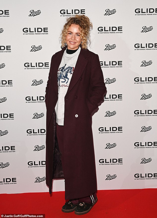 TOWIE's Lydia Bright looked comfortable in maroon track bottoms, an oversized white jumper and a matching maroon jacket