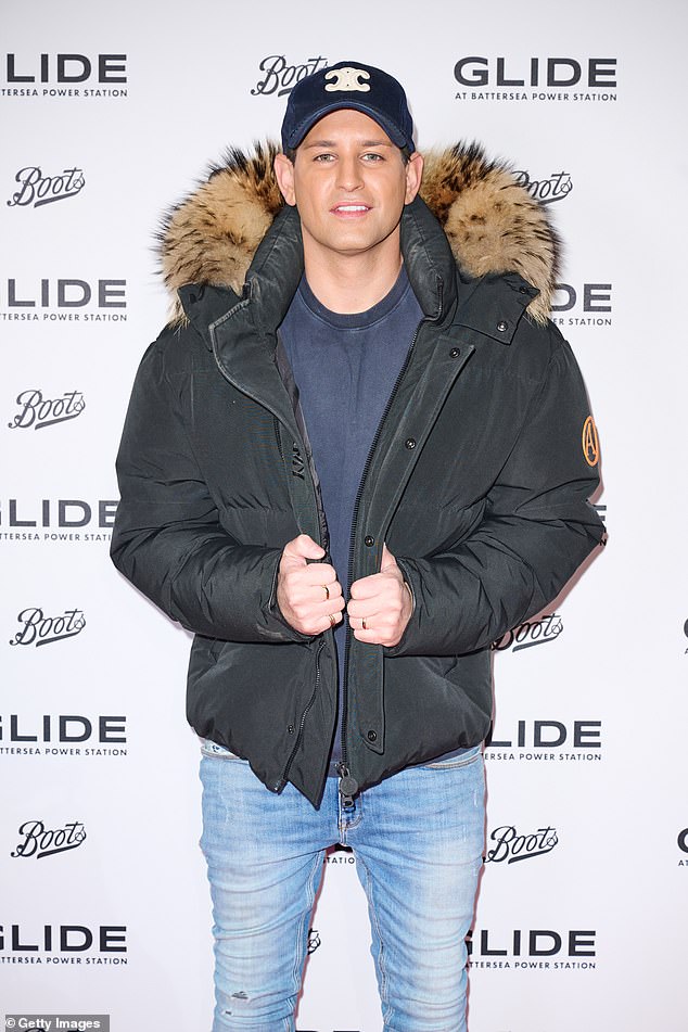 Fellow reality star Ollie Locke, 37, was also on the red carpet, wearing skinny jeans, a blue sweater and a thick black coat with a fur hood