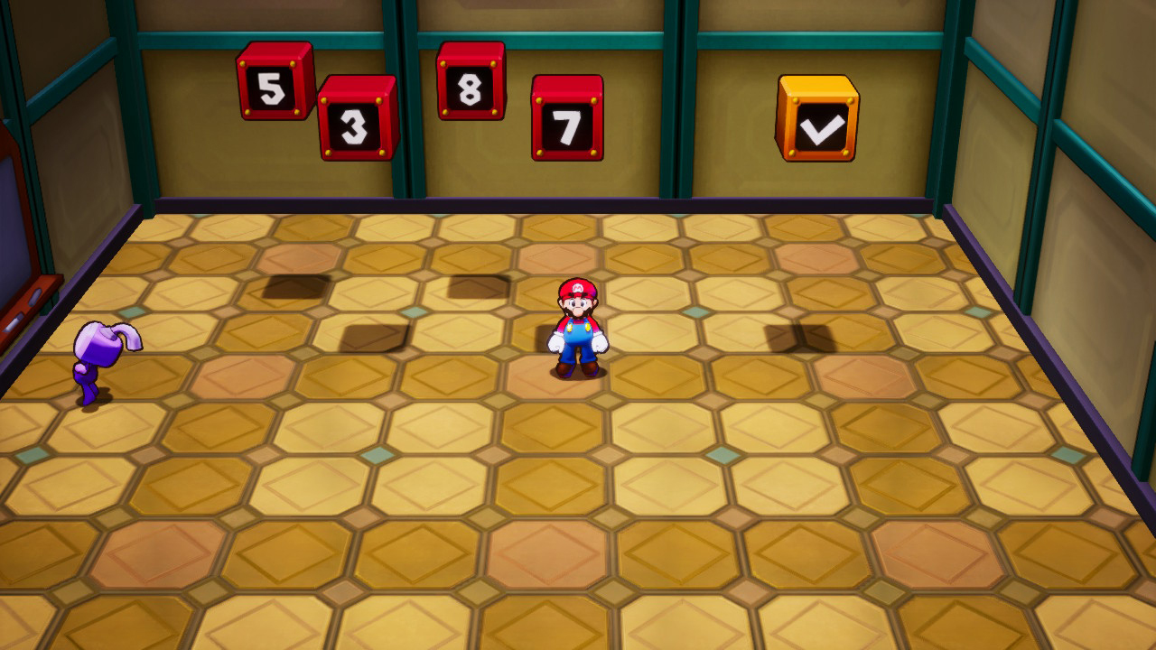 A screenshot from Mario & Luigi: Brothership, with Mario standing under a series of number pads in an office building