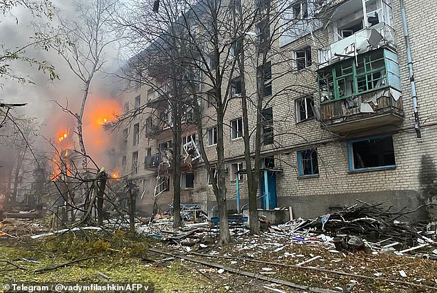 A burning residential building after a rocket attack in Mykolaivka, Donetsk region, today