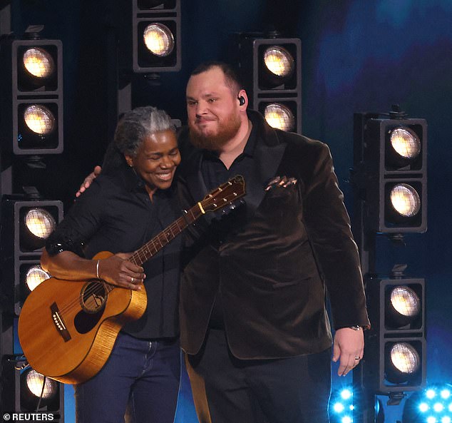 His cover was also nominated for a Grammy for Best Country Solo Performance. At this year's 66th Annual Grammy Awards last February, Chapman joined Combs on stage to perform the song together; pictured on February 4 in Los Angeles