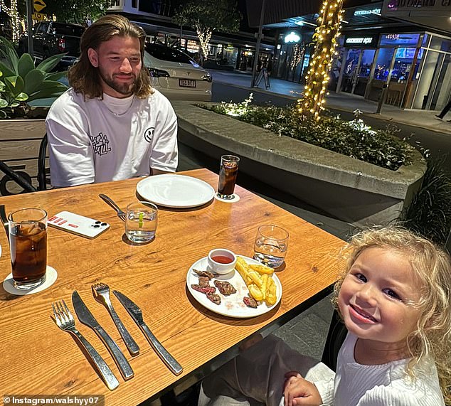 Vice-captain Pat Carrigan (pictured with Reece Walsh's daughter) is another Broncos player who calls the Gold Coast home