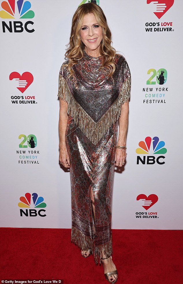 Tom Cruise's wife Rita Wilson brought a touch of Malibu chic to the proceedings in a shimmering chrome and silver dress dripping with fringe