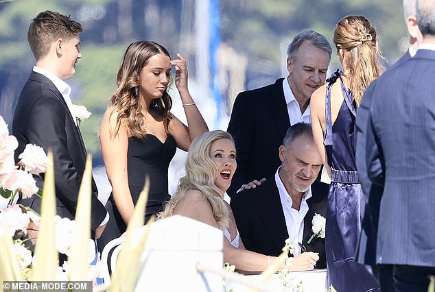 Sophie's daughter, Bella, 19, was her maid of honor, while her son Jack, 15, was Steve's best man. Both in the photo on the left