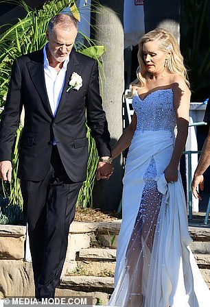 Steve also looked dapper for his big day in a black tuxedo, white button-up shirt and dress shoes