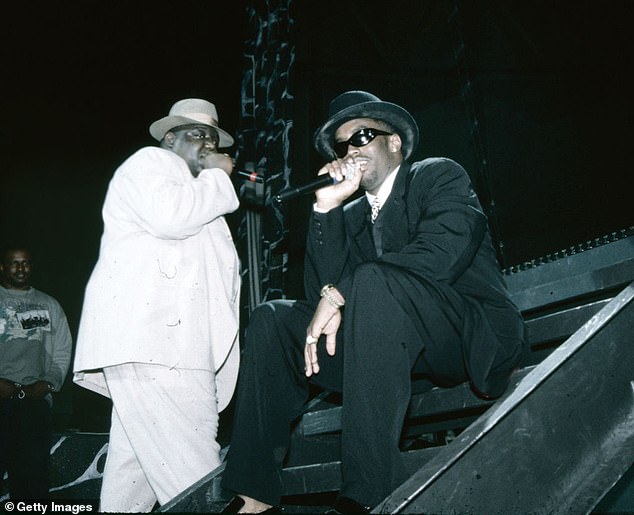 Biggie (left) and Diddy (right) perform at the International Ampitheater in Chicago in April 1995.