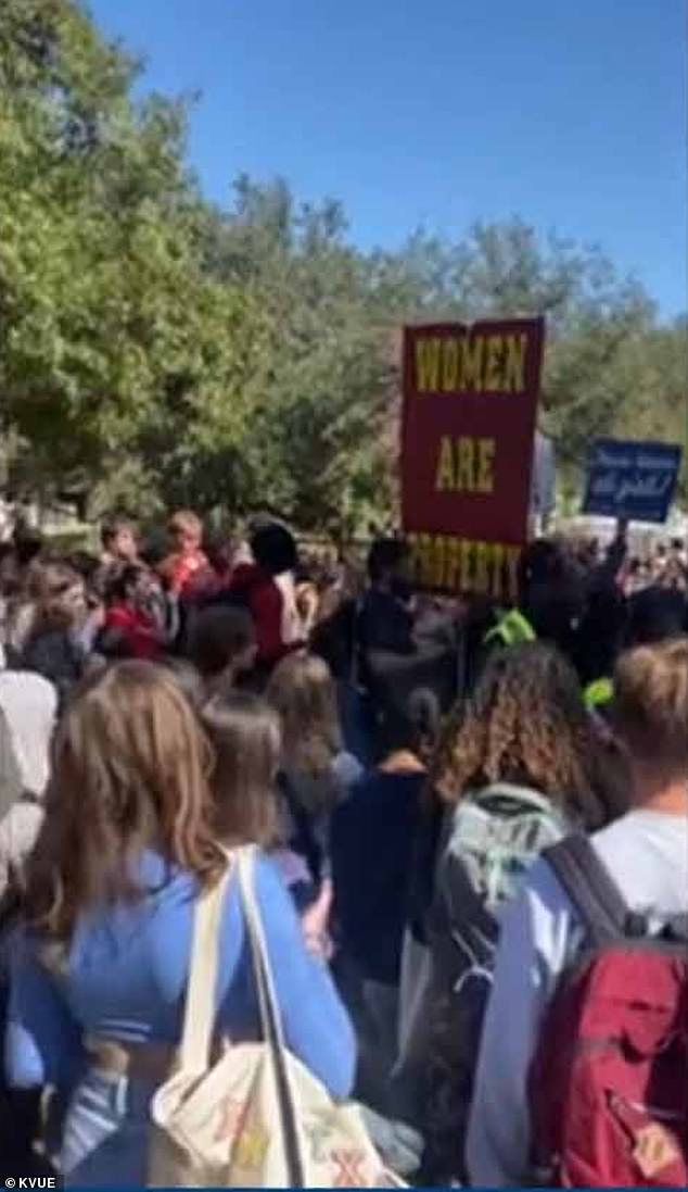 A crowd of students surrounded the unwanted protesters, some shouting at them to leave