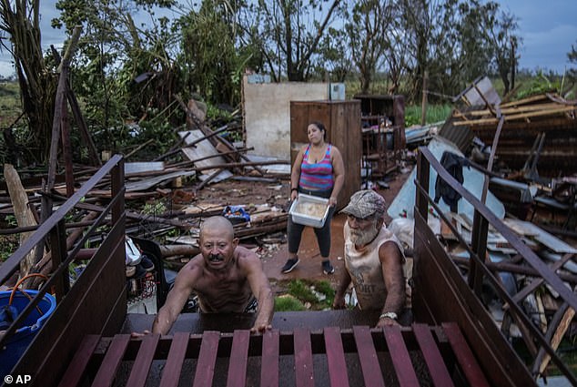 Homes in western Cuba were destroyed after Hurricane Rafael, a Category 3 storm, made landfall in the country on Wednesday.