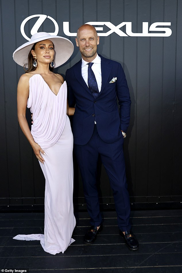 After suffering painful symptoms all week at the races, Rozalia (pictured with Nick) said she was 'floored' when the doctor told her she had shingles