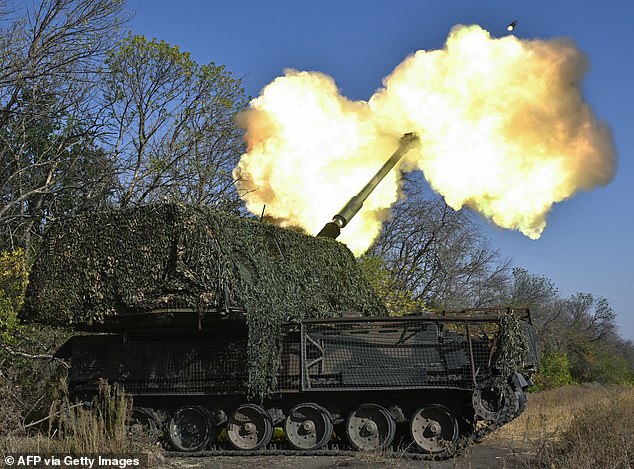 Ukrainian soldiers from the 26th Artillery Brigade fire an AHS Krab self-propelled howitzer at Russian positions near the front line in the Khasiv Yar area