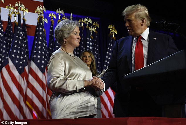 Republican presidential candidate, former US President Donald Trump, praises his campaign senior adviser Susie Wiles during an election night event at the Palm Beach Convention Center