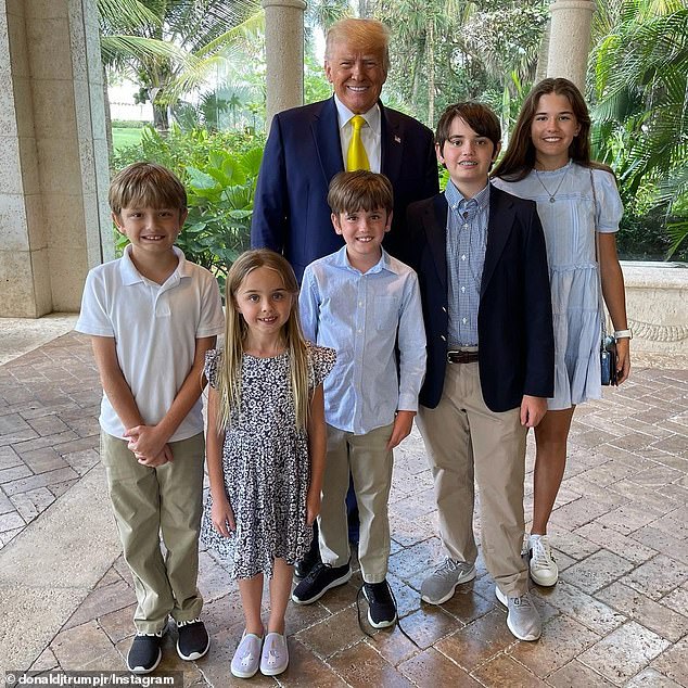 Donald Trump posed for a photo with his son Don Jr.'s five children. on Easter 2021