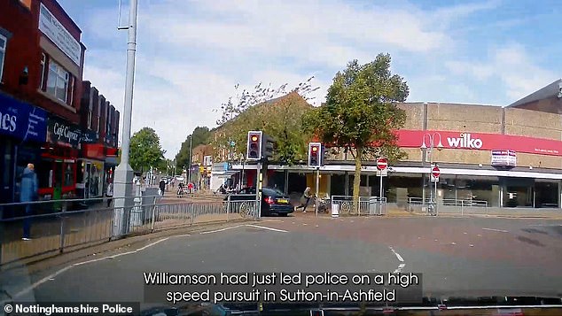 Seconds later, Williamson is seen driving through a crosswalk, narrowly missing a woman pushing a stroller