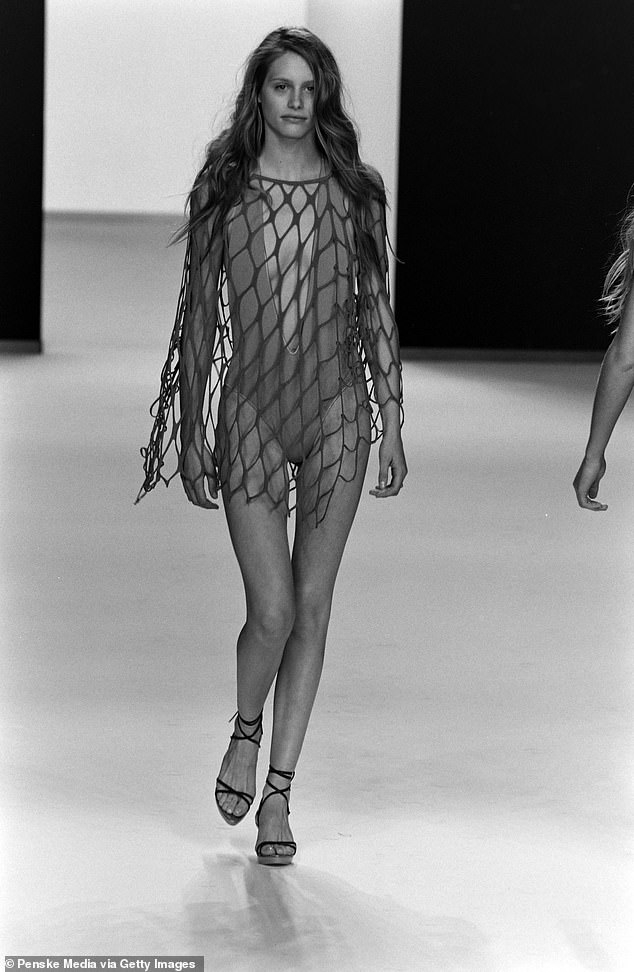 2000: Model Georgina Cooper on the catwalk