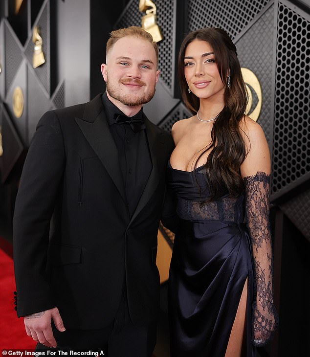 Brianna, pictured here with Zach at the Grammys in February, says she was 'caught off guard' by their recent breakup