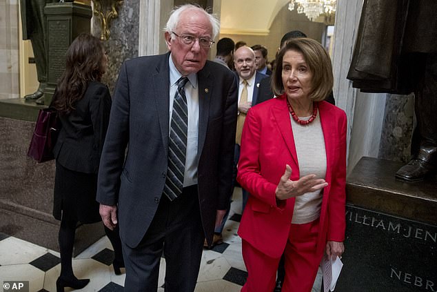 Sen. Bernie Sanders, I-Vt., left, and House Speaker Nancy Pelosi of California, right, walk together