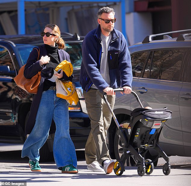 Lawrence and husband Cooke Maroney are expecting their second child. The couple, who married in 2019, are parents to two-year-old son Cy (pictured in New York City in March 2023)